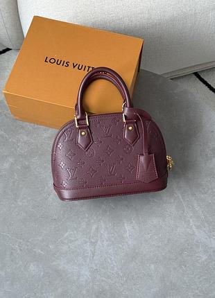 Сумка louis alma monogram empreinte vuitton leather burgundy