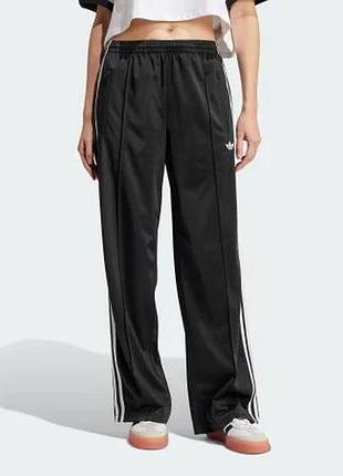 Adidas спортивні жіночі чорні штани adicolor classic firebird loose track з нюансом розмір m jc8245