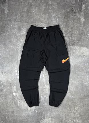 Чоловічі спортивні штани карго nike найк оригінальні нейлонові штани з кишенями m ідеальний стан