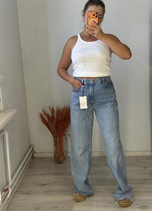 Джинси zara з необробленими низом