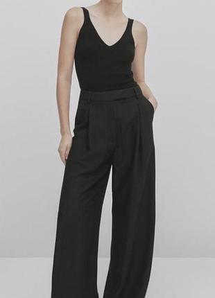Штани палаццо zara з защипами чорного кольору