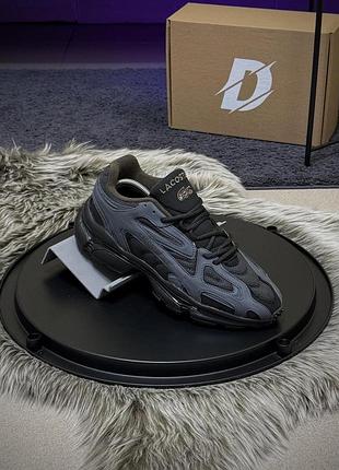 Кроссовки lacoste l003 2k24 лакост л003 2к24 из кожи и сетки черно-серые мужские для повседневной носки