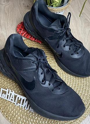 Вживані чоловічі бігові кросівки nike revolution у чорному кольорі 48,5р/32см