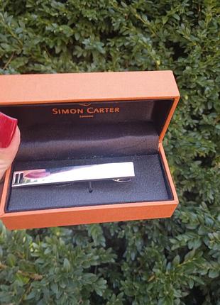 Заколка для галстука как мужская так и женская от известного бренда simon carter в новом состоянии.англия