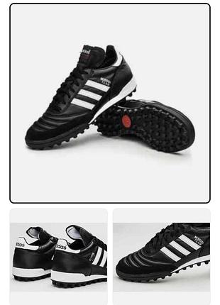 Черные кожаные сороконожки adidas mundial team, которые имеют классический дизайн с белыми полосками