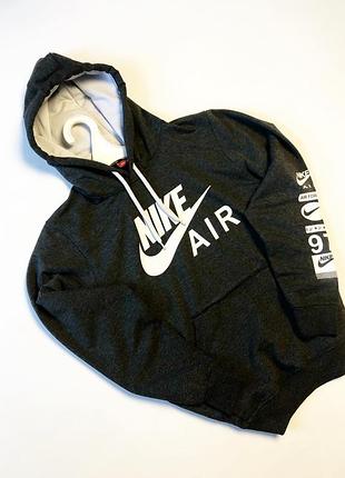Спортивне худі nike air у темно-сірому кольорі
​стильна та затишна кофта з капюшоном, великим логотипом nike air спереду