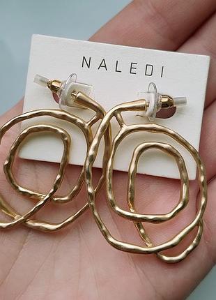 Стильні масивні сережки naledi / золотисті сережки абстракція