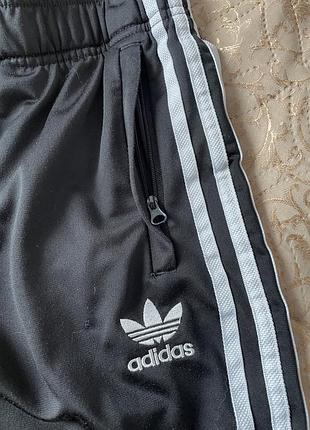 Adidas спортивні штани 3-stripes  оригінальні спортивні штани adidas, чорні, з фірмовими 3 смужками та логотипом trefoil.