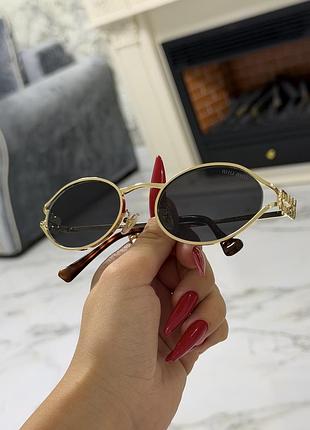 Сонцезахисні окуляри miu miu