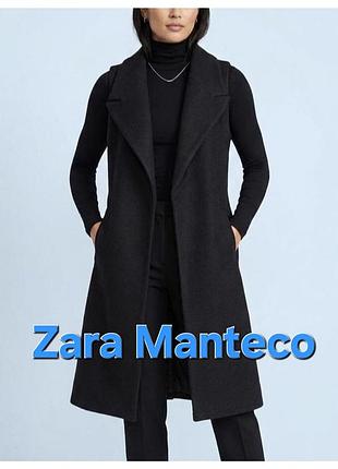 Красивной жилет zara manteco черного цвета.