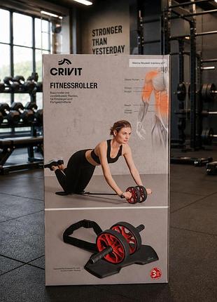 Фітнес-ролик  бренду crivit із регульованими ременями для тренування м'язів живота, спини, плечей і рук.
