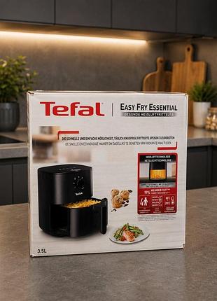 Мультипіч tefal easy fry essential (модель ey130815) — це компактна аерофритюрниця потужністю 1400 вт із чашею об'ємом 3.5 л та механічним керуванням.