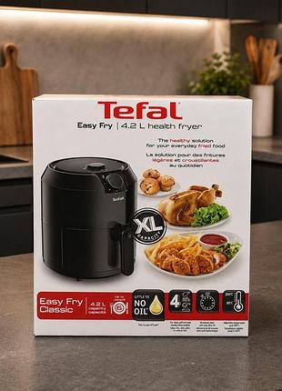 Мультипіч tefal easy fry classic ey201815 є місткою аерофритюрницею з об'ємом чаші 4,2 л та механічним керуванням