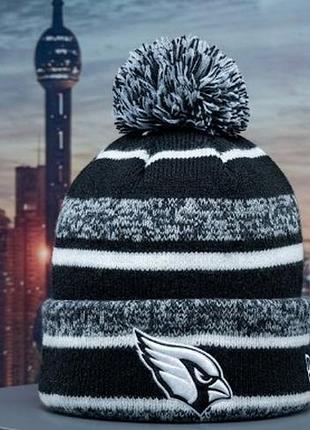 Вязаная шапка с помпоном new era nfl «arizona cardinals» 
коды аутентичности: rn11493 / ca40289 из серии nfl (national football league).