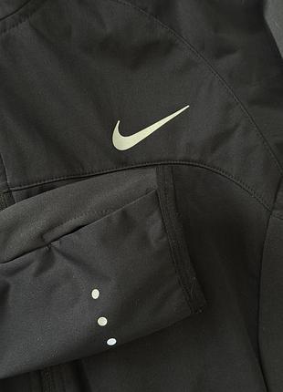 Жіноча бігова куртка nike 8