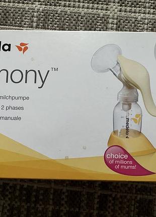 Механічний молоковідсмоктувач medela harmony
