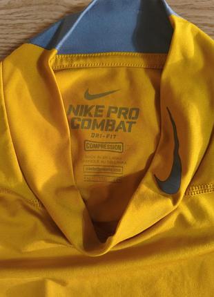 Желтый лонгслив nike pro combat 7