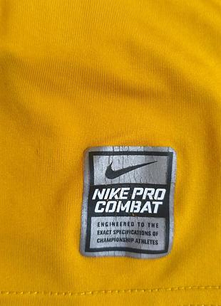 Желтый лонгслив nike pro combat 9