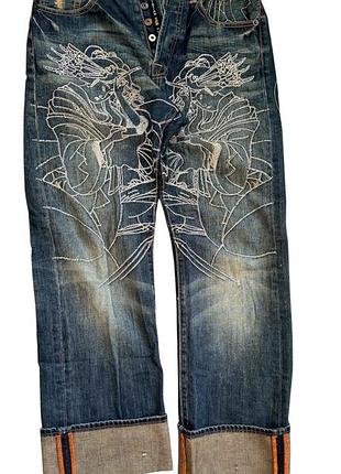 Джинси christian audigier