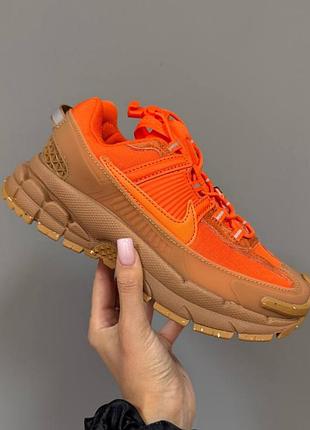 Nike zoom vomero roam
burnt orange / caramel brown