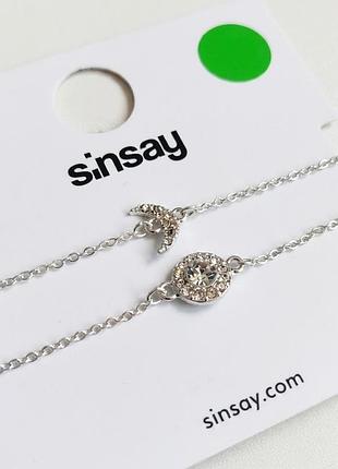 Новый комплект серебристых браслетов sinsay