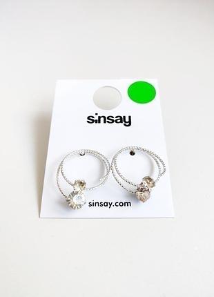 Новые серьги серебристые кольца с камушками sinsay