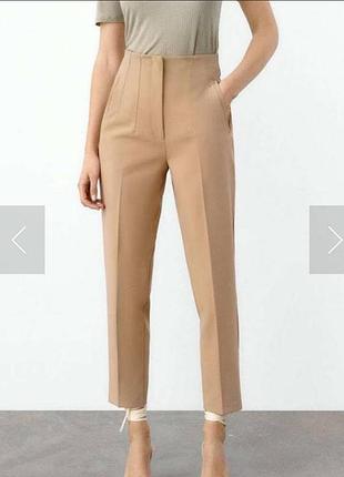 Бежеві короткі брюки zara