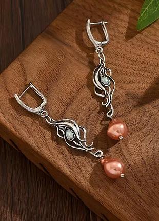 Серьги фольк с изящными изогнутыми элементами