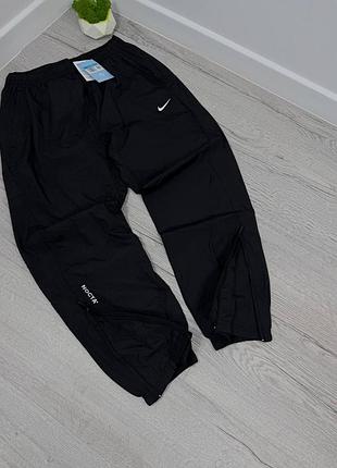 Штани від бренду nike nocta