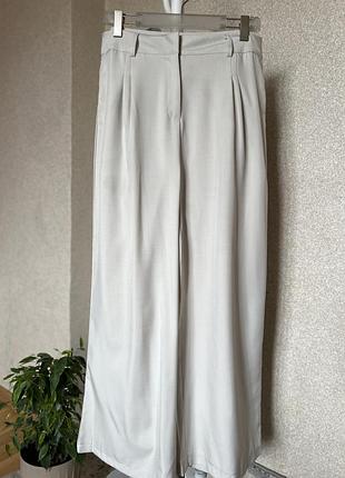 Широкі класичні брюки палаццо