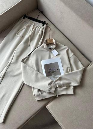 Костюм brunello cucinelli молочний штани та кофта