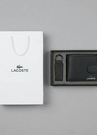 Мужское кожаное портмоне с брелком на застежке lacoste (1724-2)