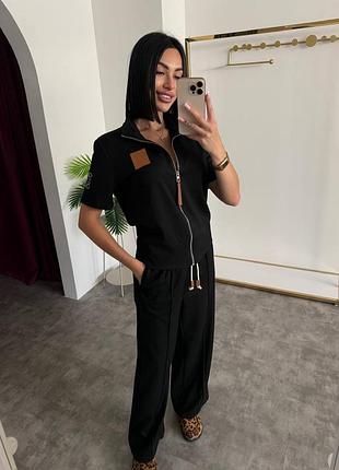 Жіночий костюм loewe в наявності