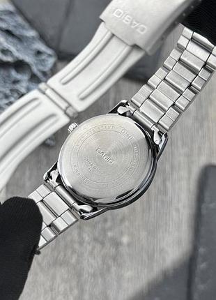 Чоловічий годинник casio mtp-v002d-2b3 original з синім циферблатом та сталевим браслетом 8