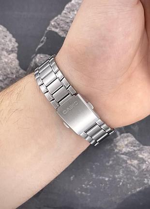 Чоловічий годинник casio mtp-1239d-2a classic з синім циферблатом та сталевим браслетом 6