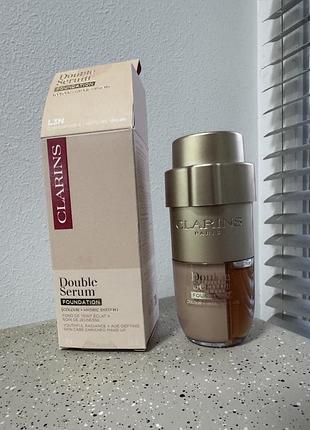 Clarins тогальний крем / флюїд