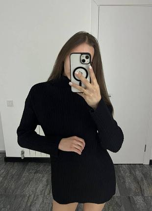 Довгий вʼязаний светр