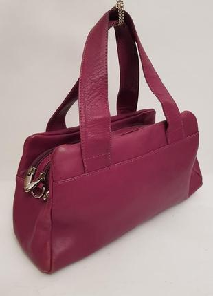 Изумительная кожаная сумочка nova leather красивый сливовый цвет.