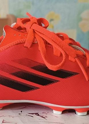 Красные футбольные бутсы adidas x speedflow.4 р. 30,5-19 см.