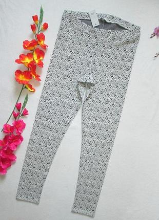 Класні фактурні стрейчеві трикотажні жіночі легінси принт абстракція river island