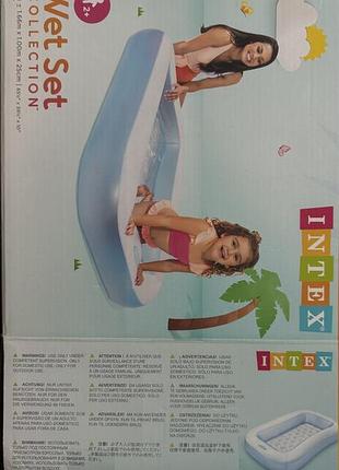 Дитячий надувний басейн intex wet set collection 166x100x25 см