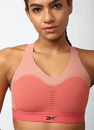 Жіночий спортивний бра reebok puremove+ рожево-кораловий розмір m