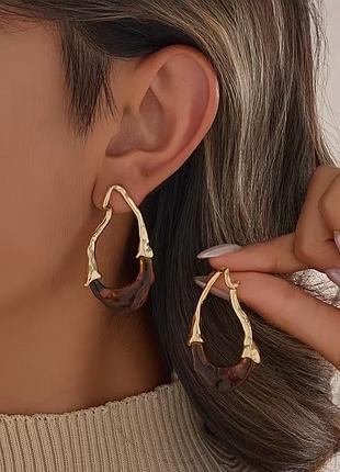 Сережки пара сережки-кільця золотисті зігнутої форми жіноча біжутерія сережки комплект мідний сплав