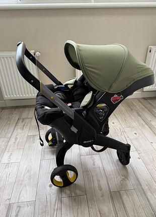 Doona+ автокрісло-коляска desert green + isofix + аксесуари