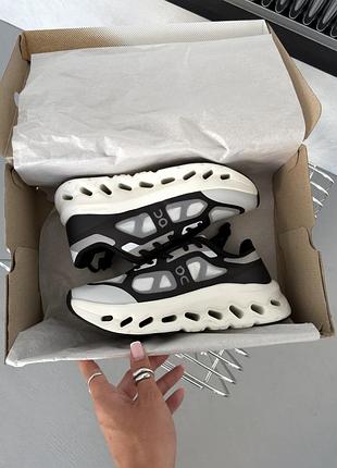 On running cloudtilt remix black/ivory 3