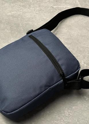 Борсетка reebok синяя 600д черное лого 6