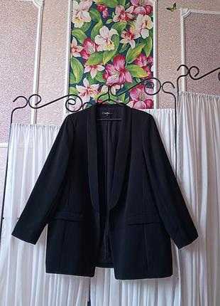 Красивий чорний піджак next tailoring.