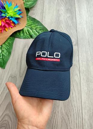 Темно-синя спортивна бейсболка з білим вишитим написом «polo» та червоним бренду «ralph lauren» на передній панелі розмір one size