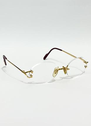 Золоті окуляри cartier
