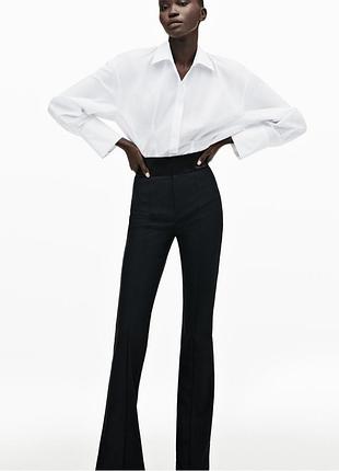 Брюки клеш с атласной вставкой zara
